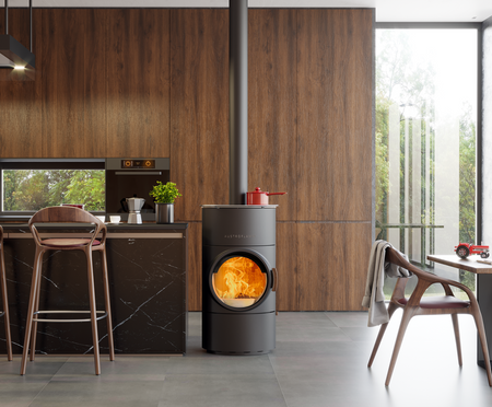 Schwarzer Austroflamm Kaminofen Clou Compact Cook mit Flammenbild im runden Sichtfenster in moderner Kueche | Klimaworld.com