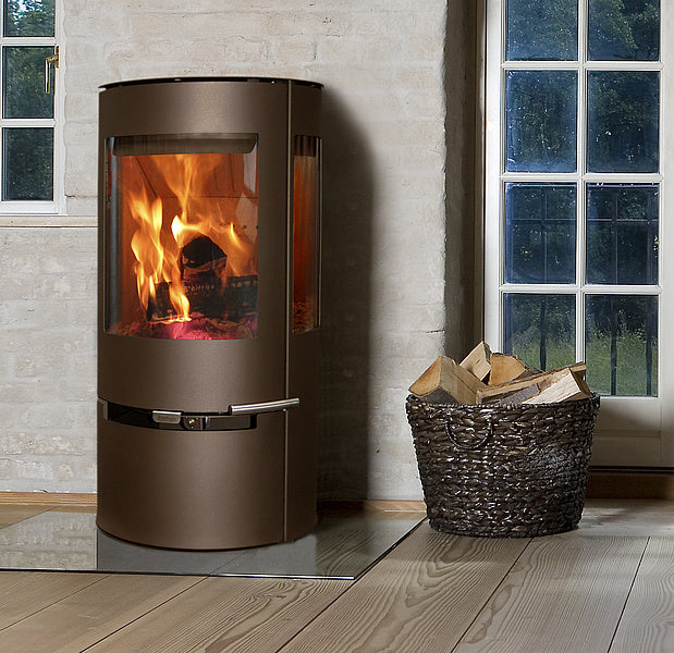 Kaminofen Aduro 9 Stahl braun-metalic 6kW Ofen mit Hintergrund